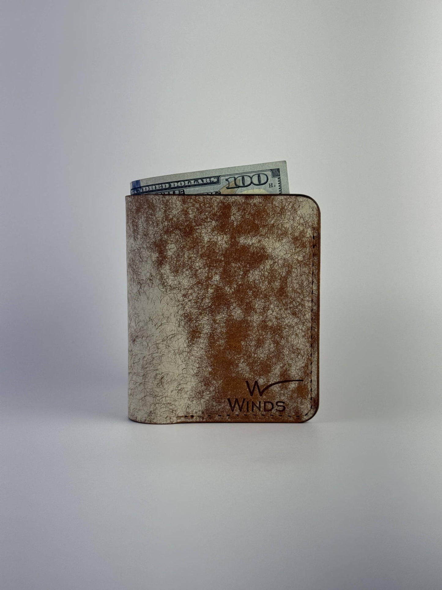 brown glance leather wallet front side view with cash and Winds logo, on a white background