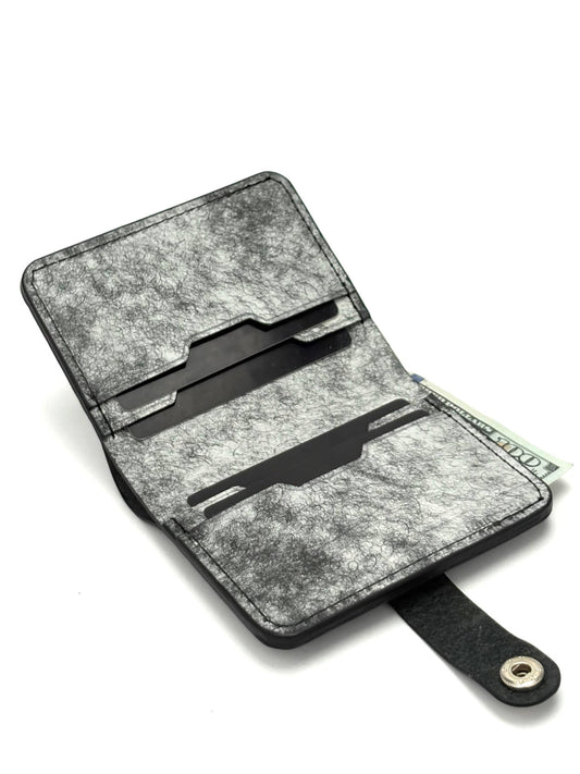 black glance bifold wallet with strap, opened front view with cards and cash