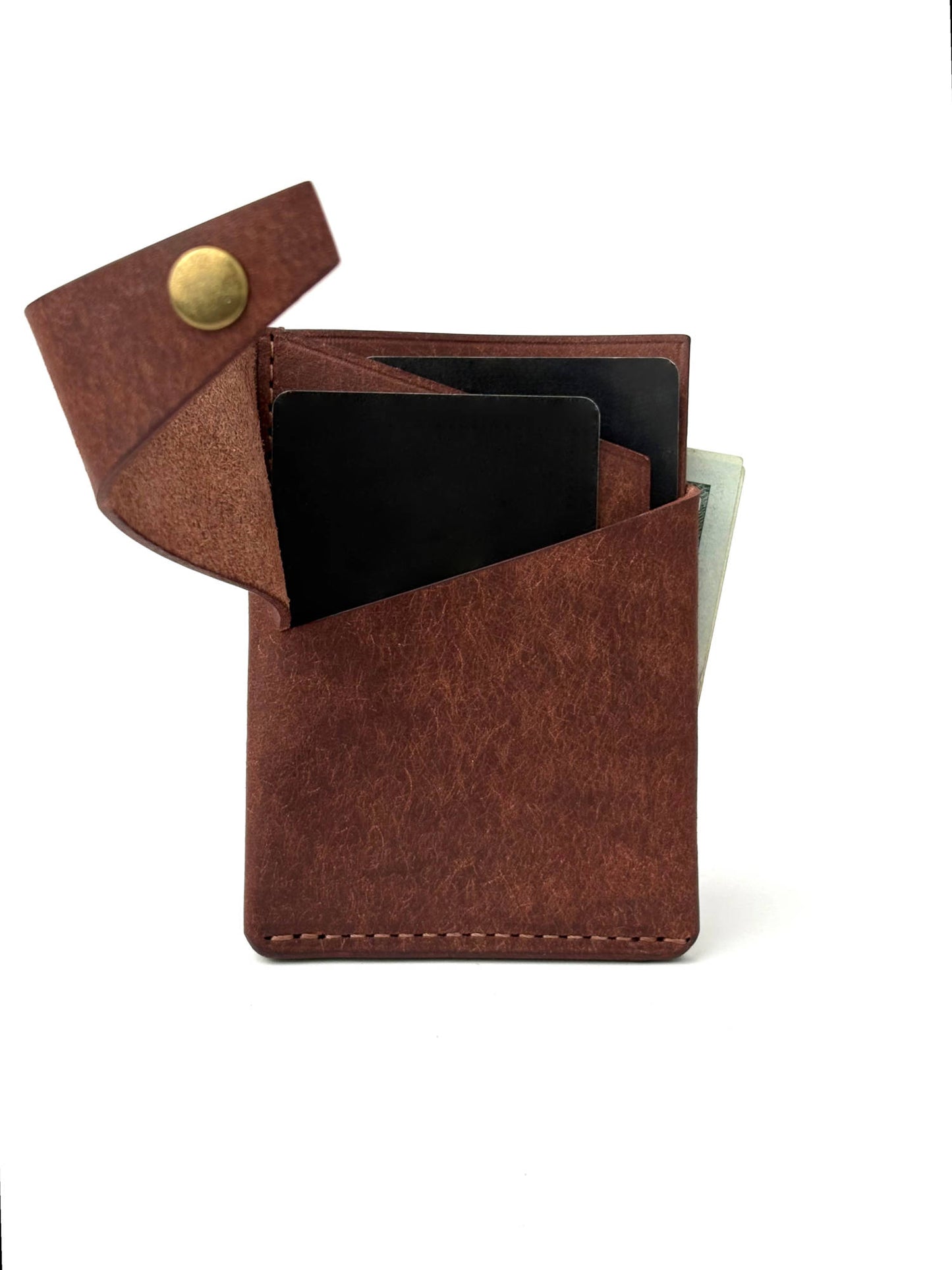 chestnut brown keeper leather wallet front view opened with cash and cards