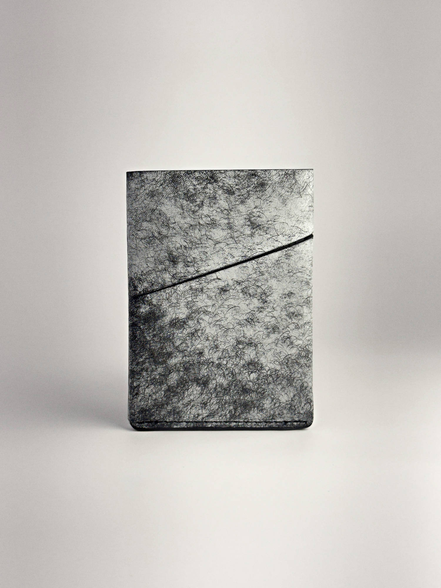 black keeper leather wallet front side view on a white background