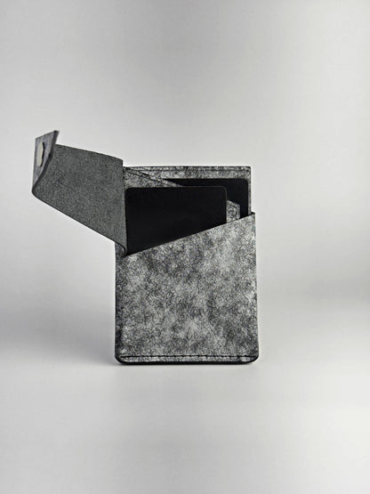 black keeper leather wallet opened with cards front side view on a white background
