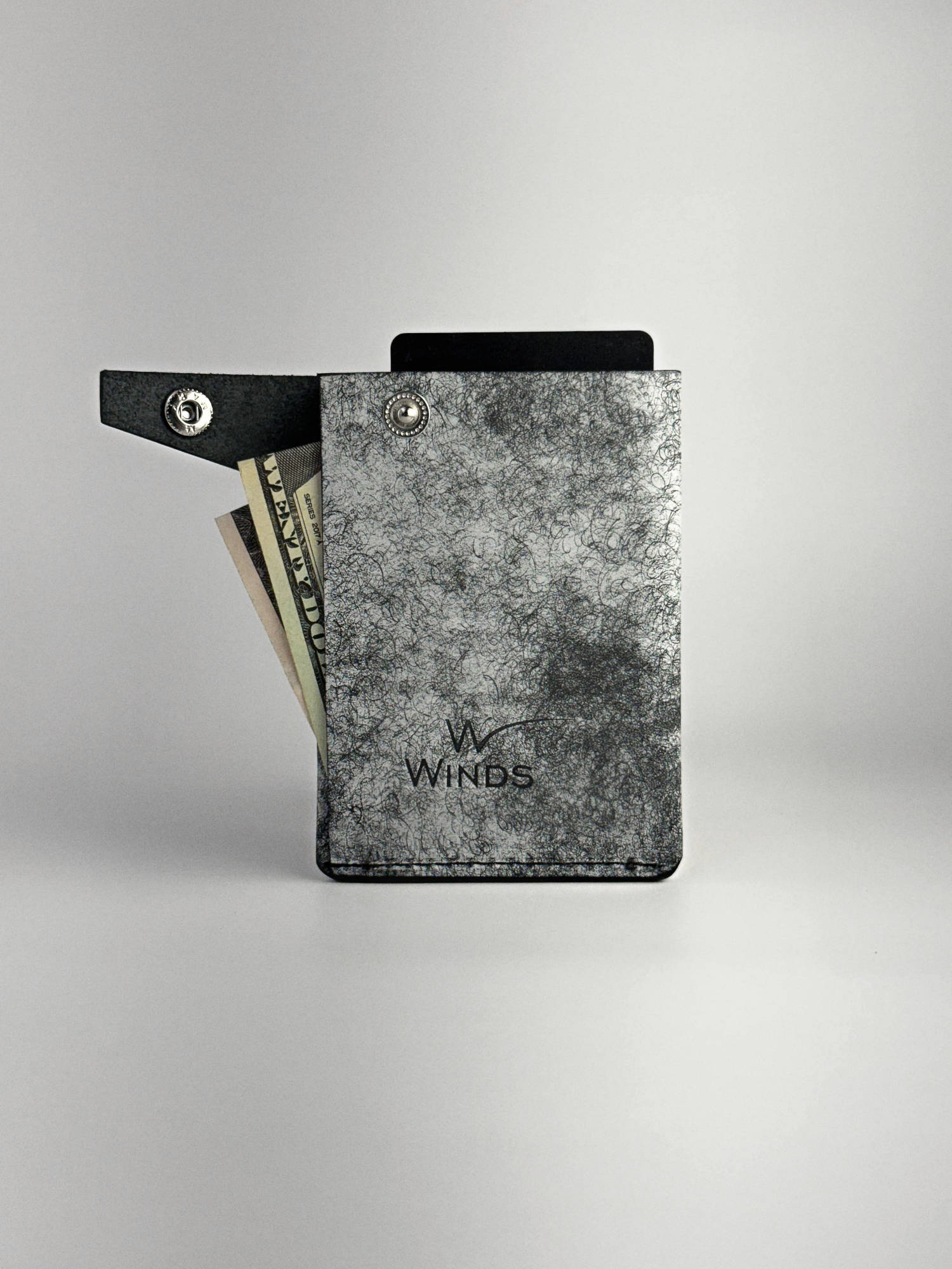 black keeper wallet opened back side with Winds logo view, on a white background
