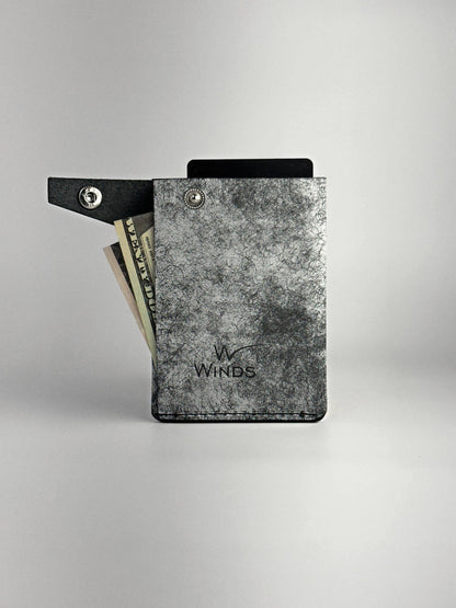 black keeper wallet opened back side with Winds logo view, on a white background