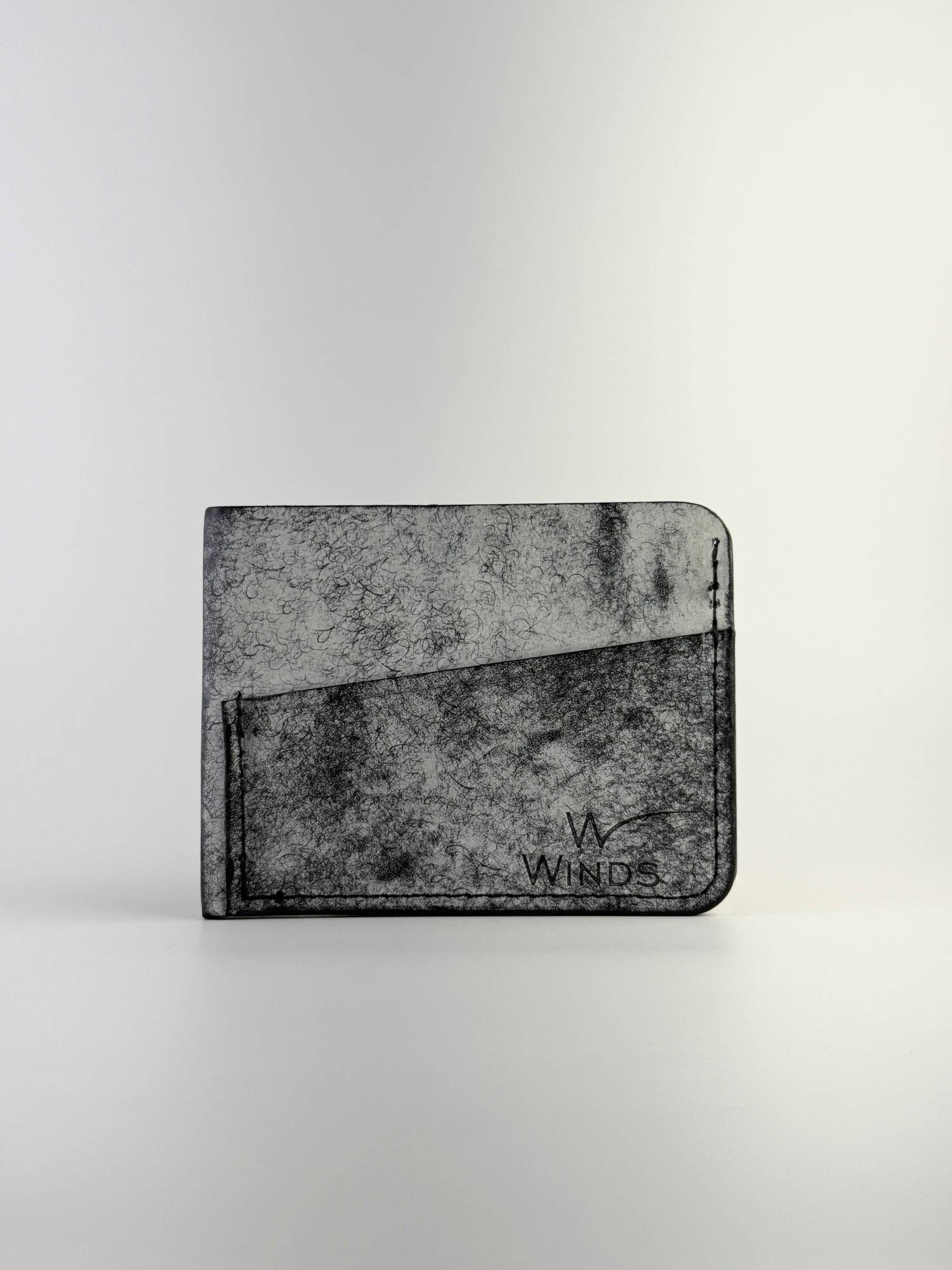 black wing leather cardholder front side, on a white background