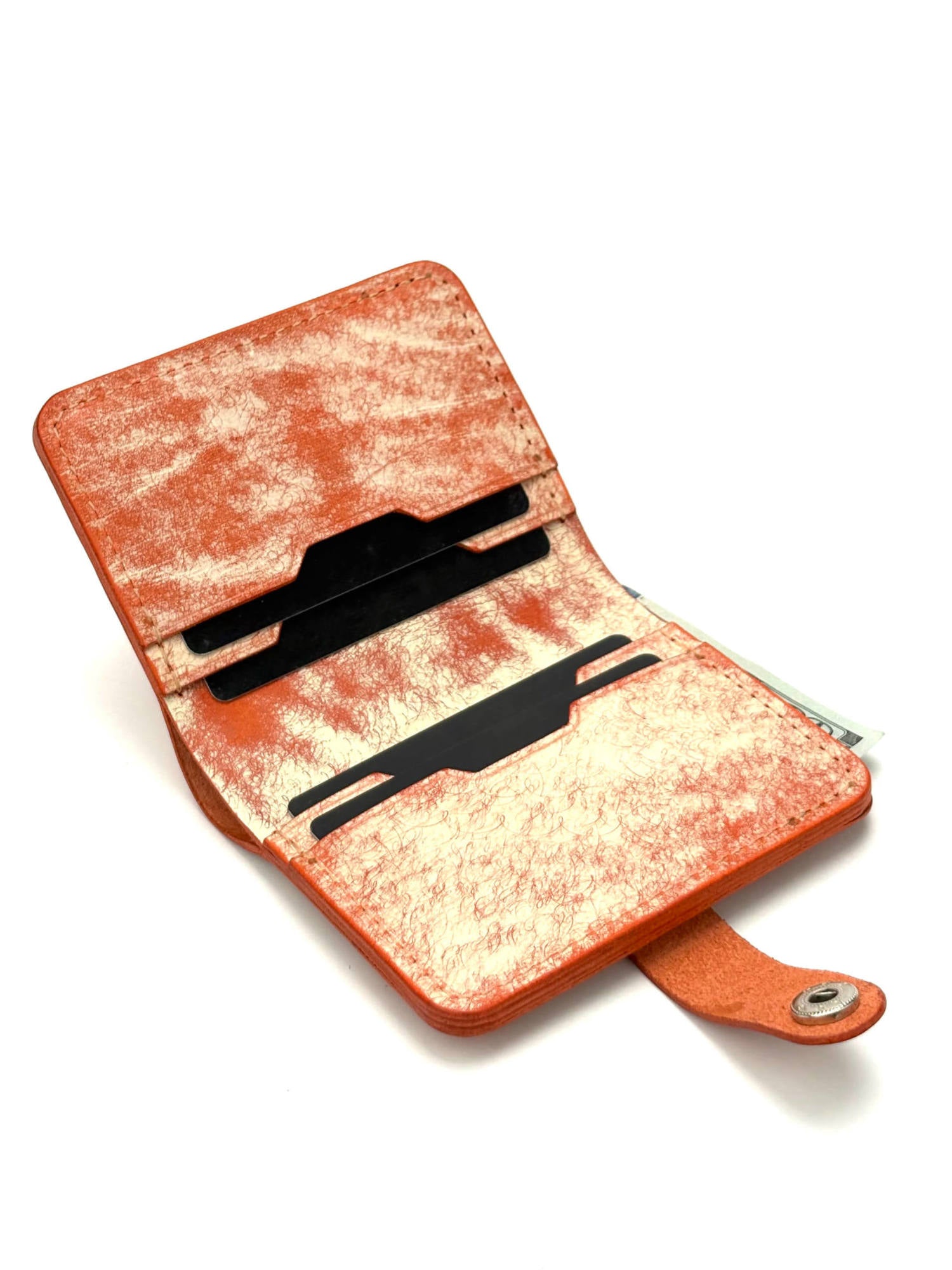 orange glance bifold wallet with strap, opened front view with cards and cash