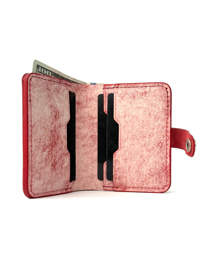 red glance bifold wallet with strap, opened front edge view with cash and cards