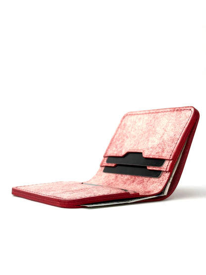 red glance leather bifold wallet front view opened with cash and cards rotated