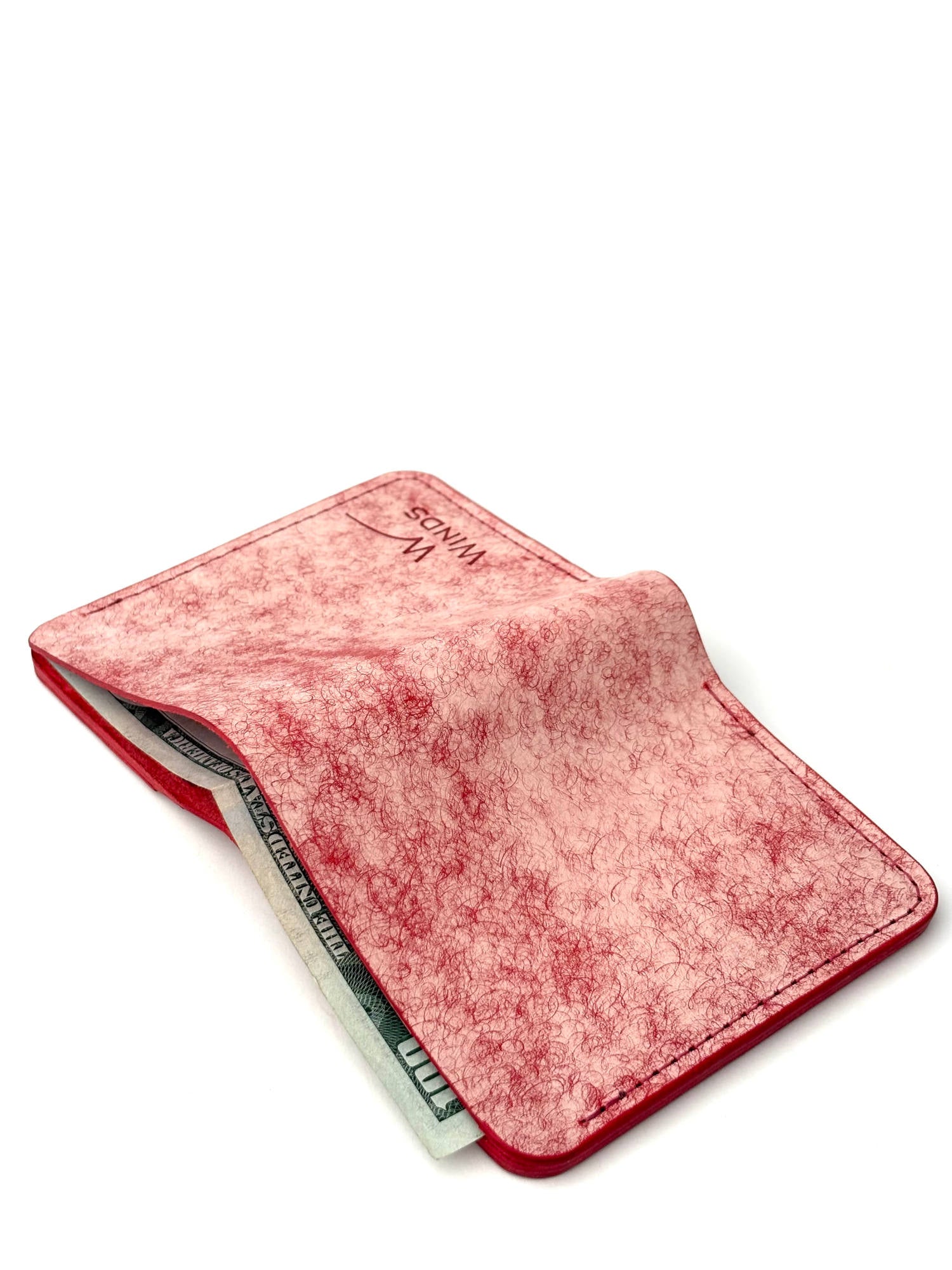 red glance leather bifold wallet back view opened with cash and Winds logo