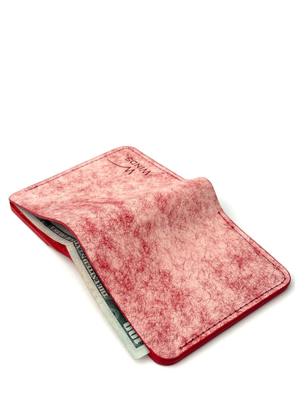 red glance leather bifold wallet back view opened with cash and Winds logo