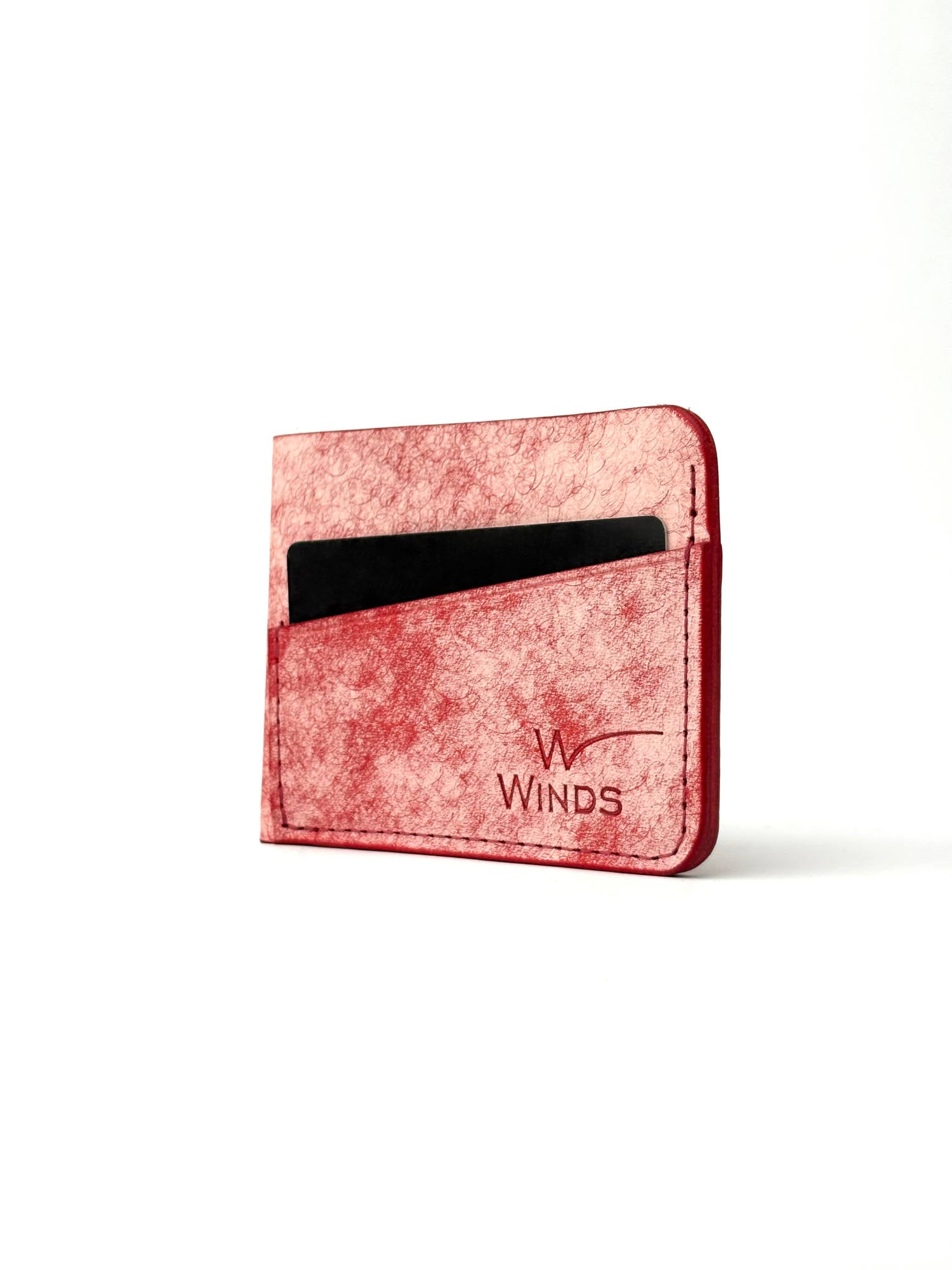 red wing leather cardholder back view rotated with cards and Winds logo