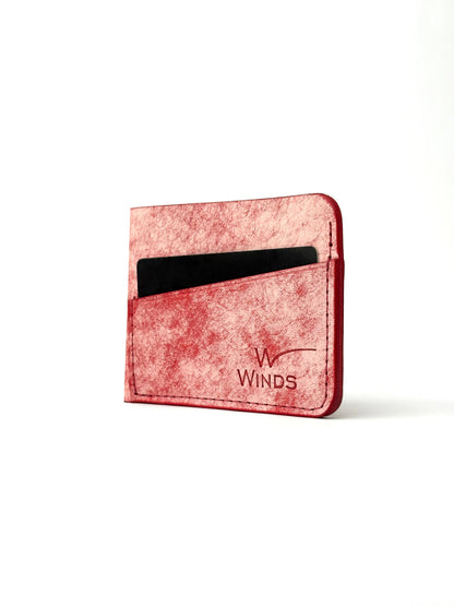 red wing leather cardholder back view rotated with cards and Winds logo